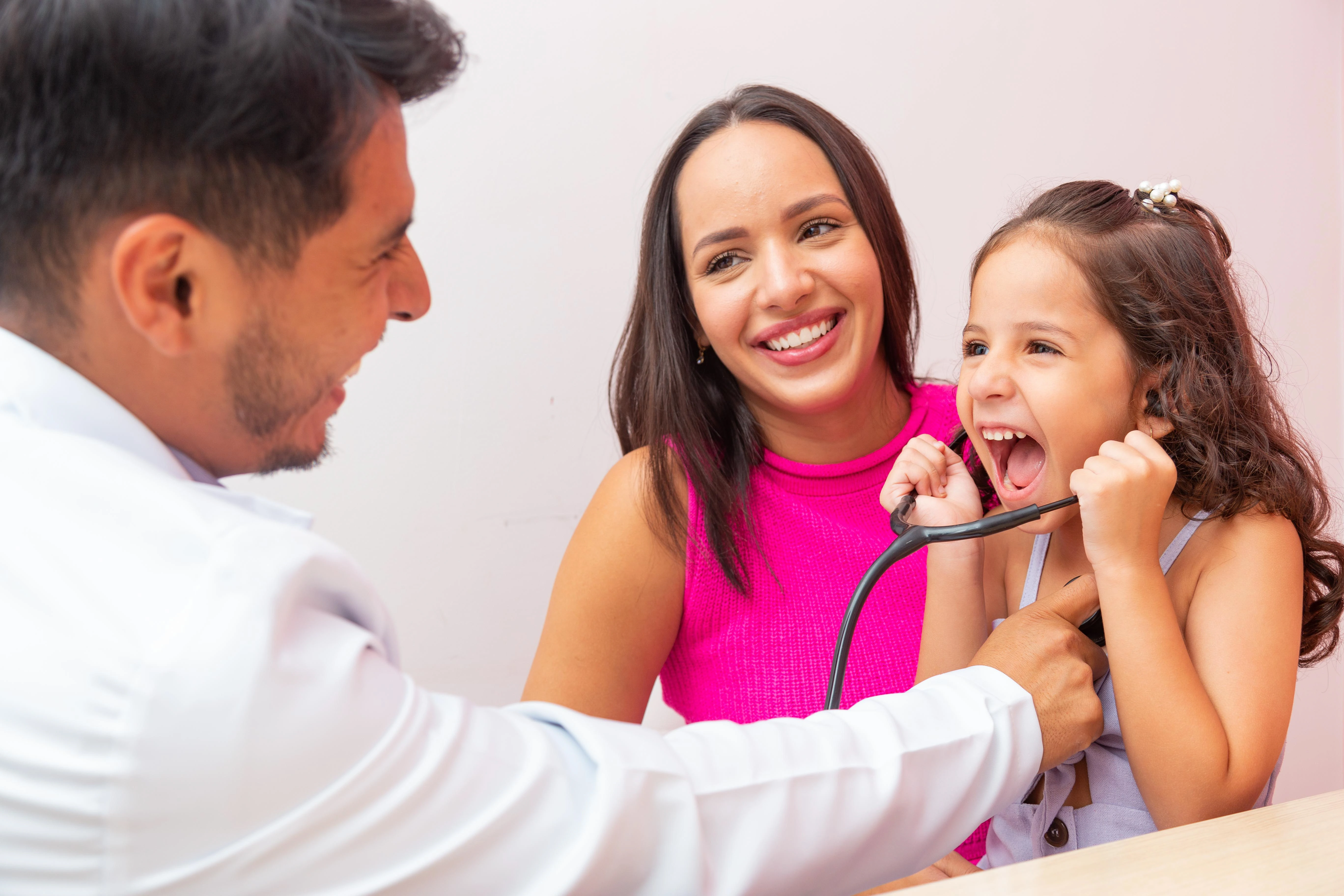 Child playing with stethoscope